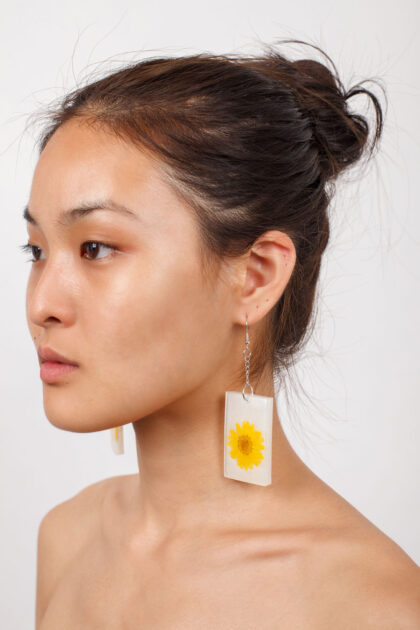 Sunflower resin earrings by Carlos Kremmer